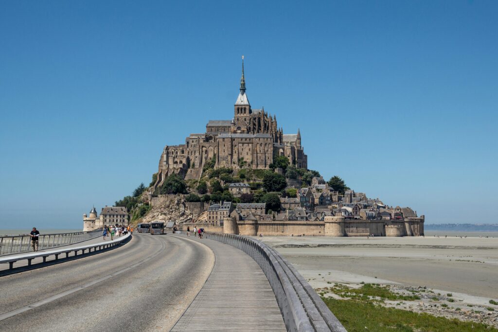 A breathtaking daytime view of Mont Saint-Michel, a famous historic landmark in Normandy, France.